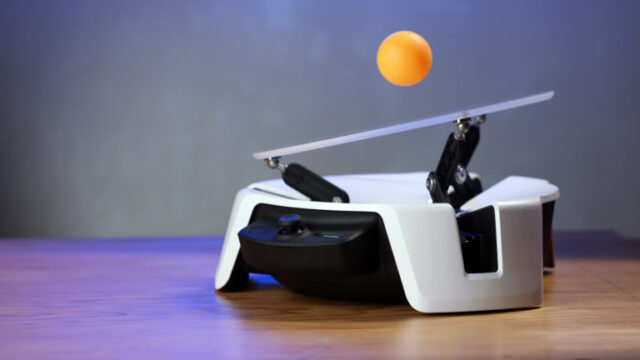Moab, a ball-balancing robot, is operated using motion control, visualized in simulation on Microsoft Project Bonsai, coordinated using trained Project Bonsai brains, and then deployed to the physical bot.