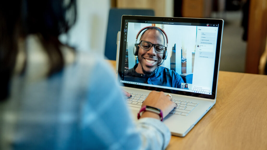 Friends online video conference by computer. Young people chat with each  other virtually in video call