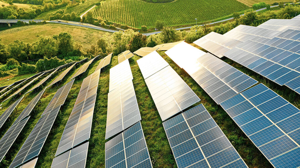 AI for Good - photo of solar panels on a green hillside