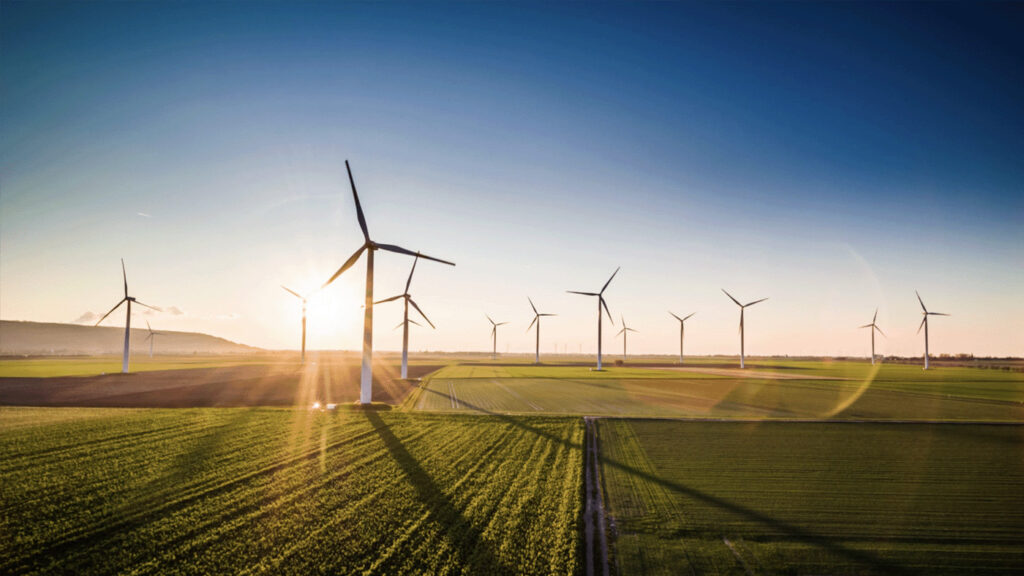 AI for Good - wind farm at sunrise