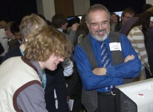 a group of people sitting in chairs