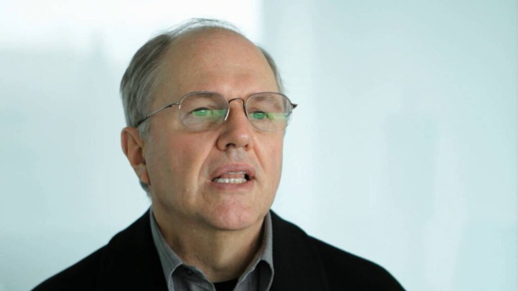 Craig Mundie wearing glasses