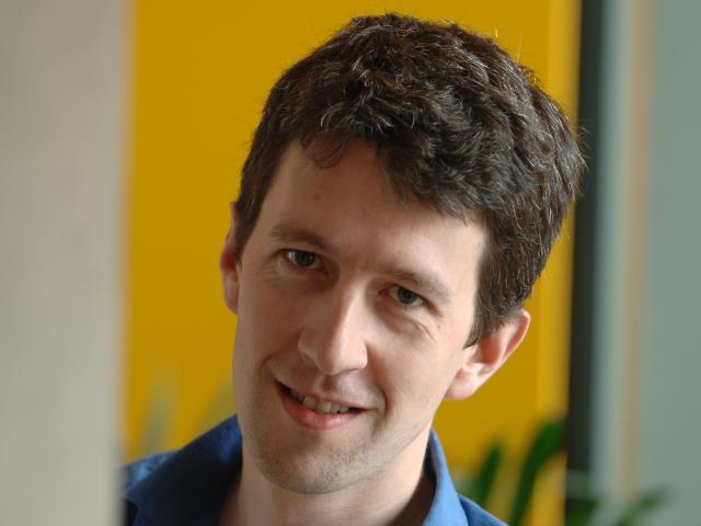 a man wearing a blue shirt