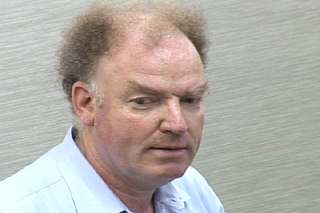 a man wearing a suit and tie