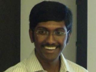 a man smiling for the camera