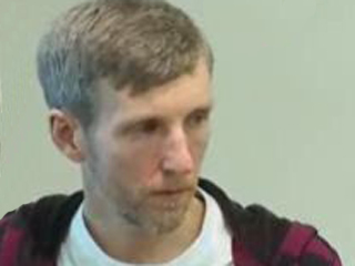 a man looking at the camera