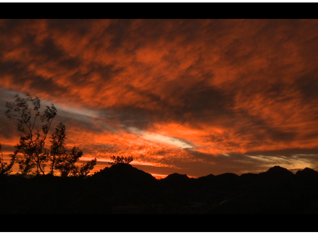 clouds in front of a sunset