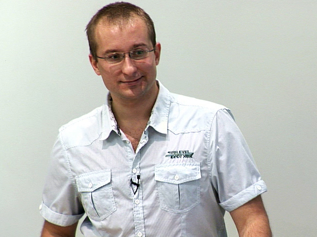 a man smiling for the camera