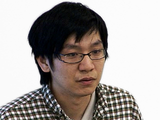 a man looking at the camera