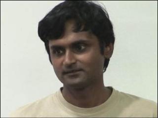 a man smiling for the camera