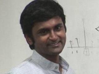 a man smiling for the camera