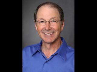 Richard Rashid smiling for the camera