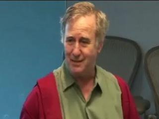 a man smiling for the camera