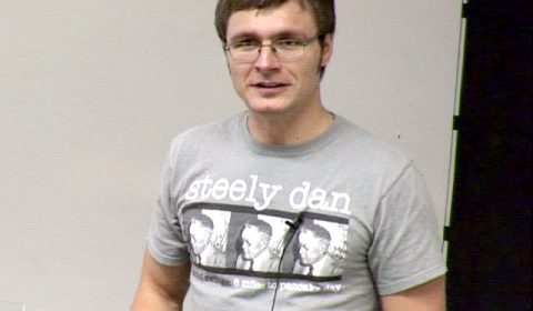 a man smiling for the camera