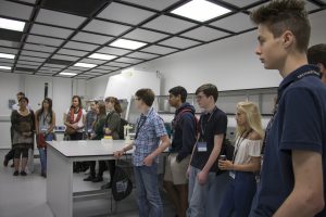 a group of people standing in a room