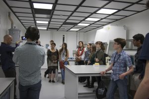 a group of people standing in a room