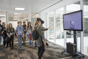 a group of people standing in a room