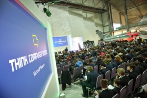 a crowd of people in a room