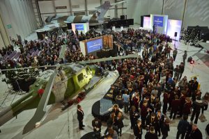 a group of people standing in front of a crowd
