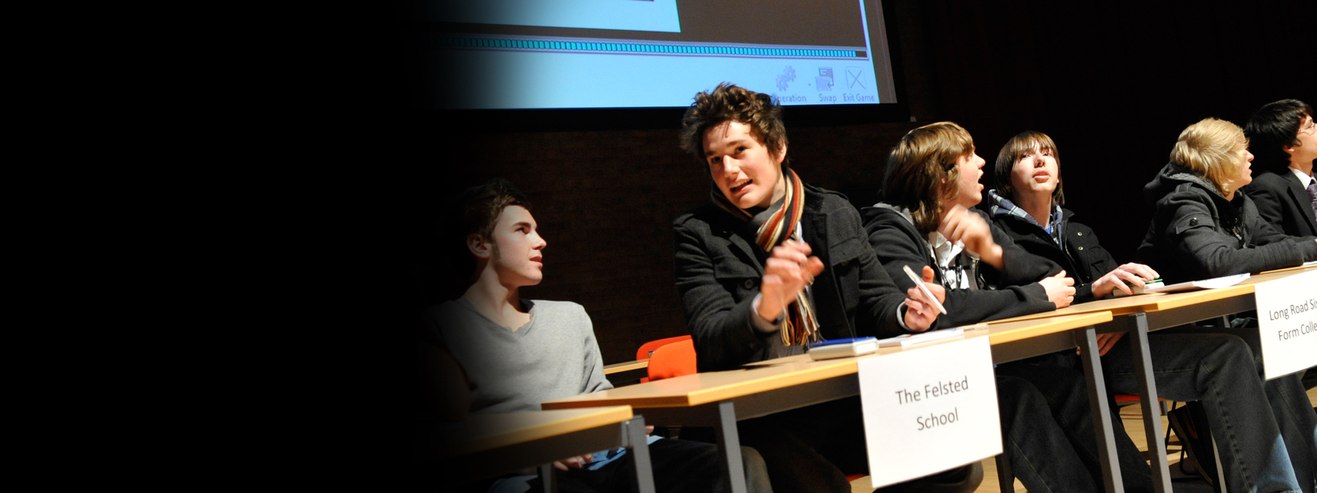 a group of people sitting at a table
