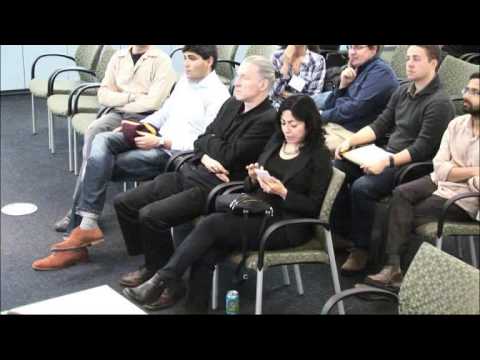 a group of people sitting in chairs