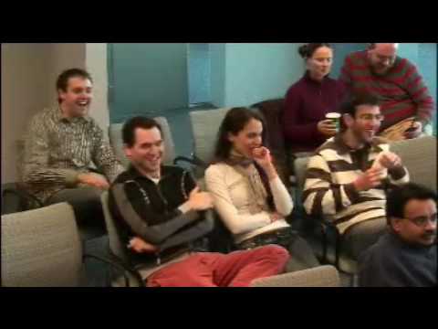 a group of people sitting posing for the camera