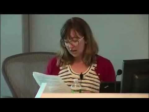 a woman sitting at a table