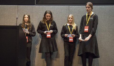 a group of people posing for the camera