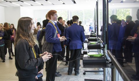 a group of people standing in front of a crowd