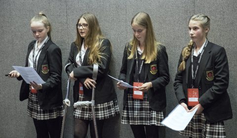 a group of people posing for the camera