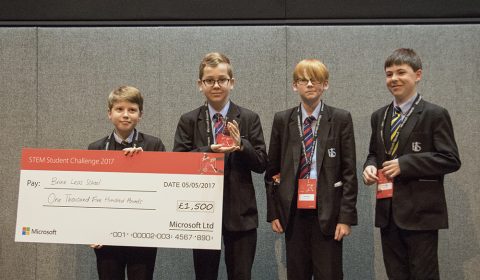 a group of people posing for the camera