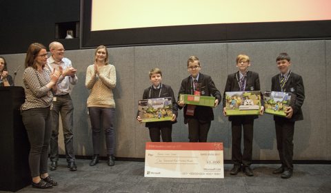 a group of people posing for the camera