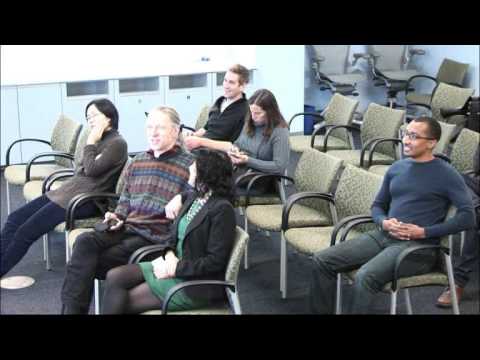 a group of people sitting in chairs