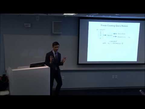 a man standing in front of a television