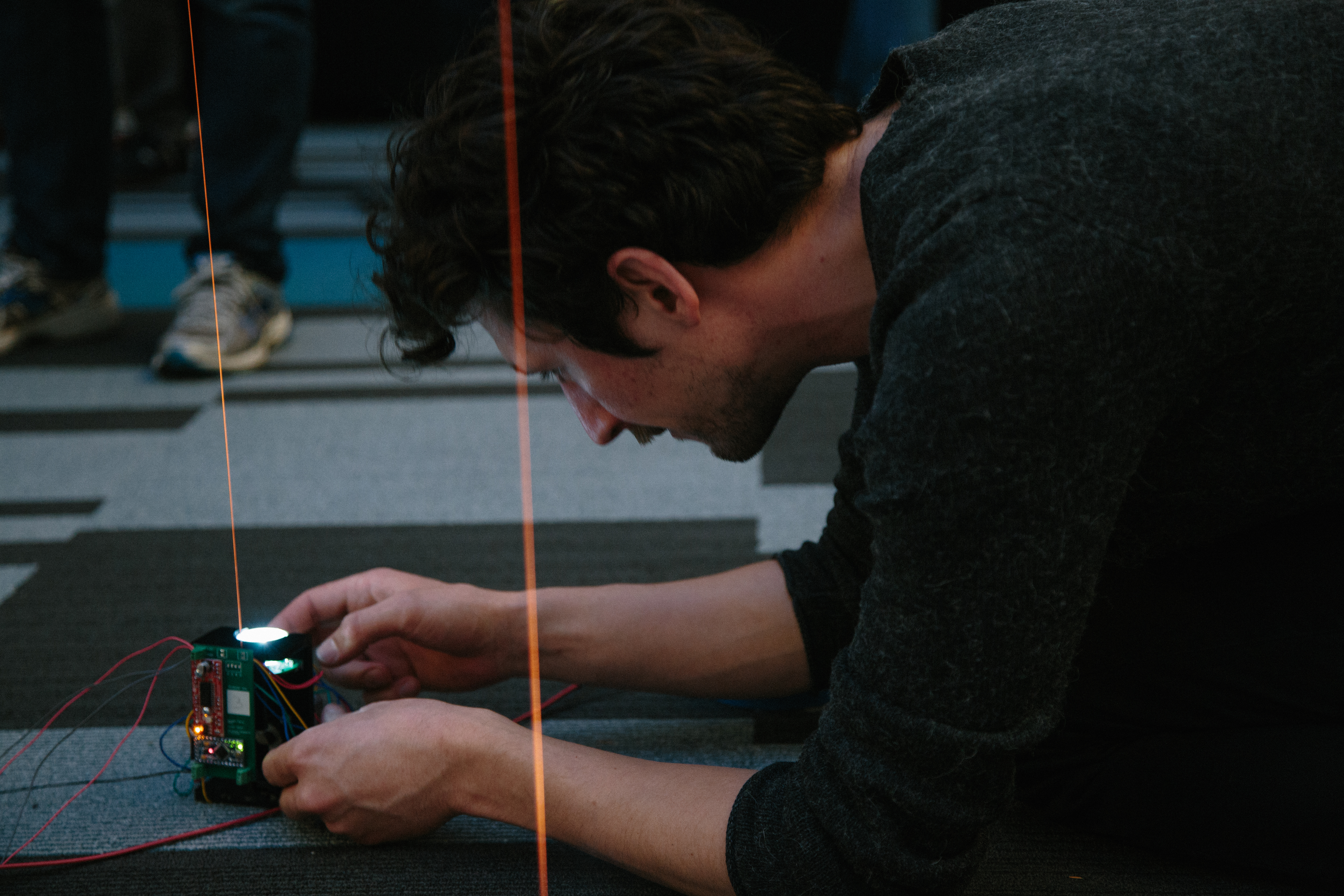 Artist working on Disparity installation