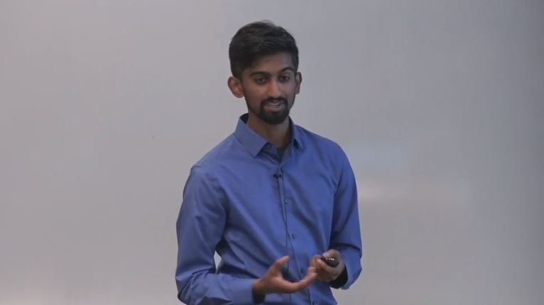 a man in a blue shirt
