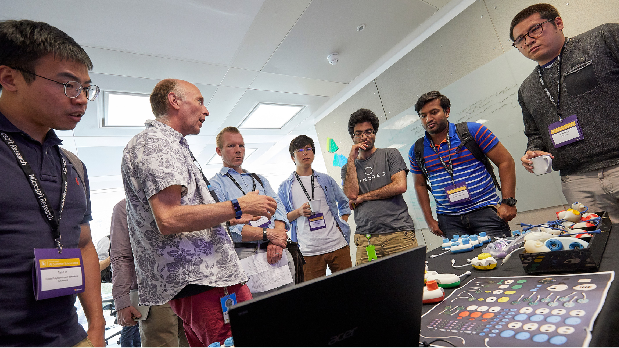 a group of people standing in a room