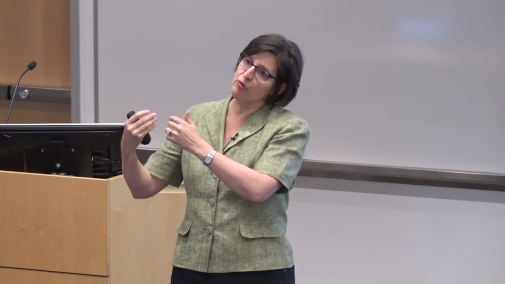a person standing in front of a mirror posing for the camera