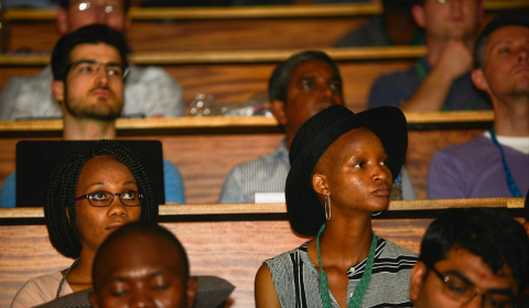 a group of people sitting at a table