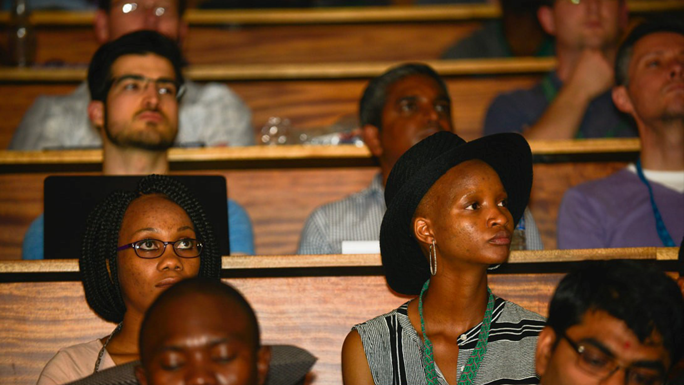 a group of people sitting at a table