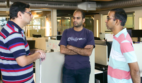 Group of guys standing around talking