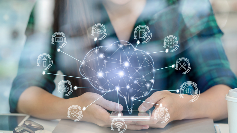 hands holding holographic brain node image