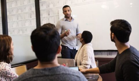 a group of people standing in a room