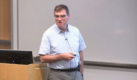 Leon Bottou from Facebook giving talk at Microsoft Research's AI Institute “Geometry of Deep Learning” 2019 Workshop