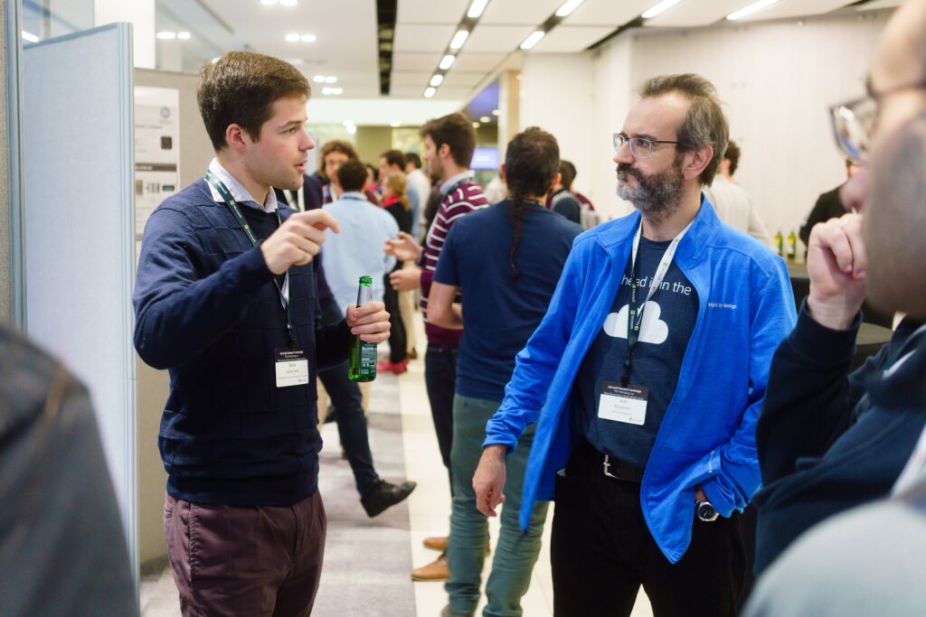 a group of people standing in a room