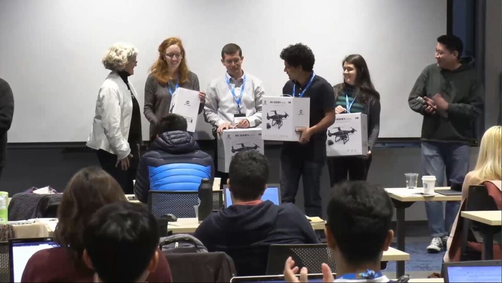 a group of people sitting at a table
