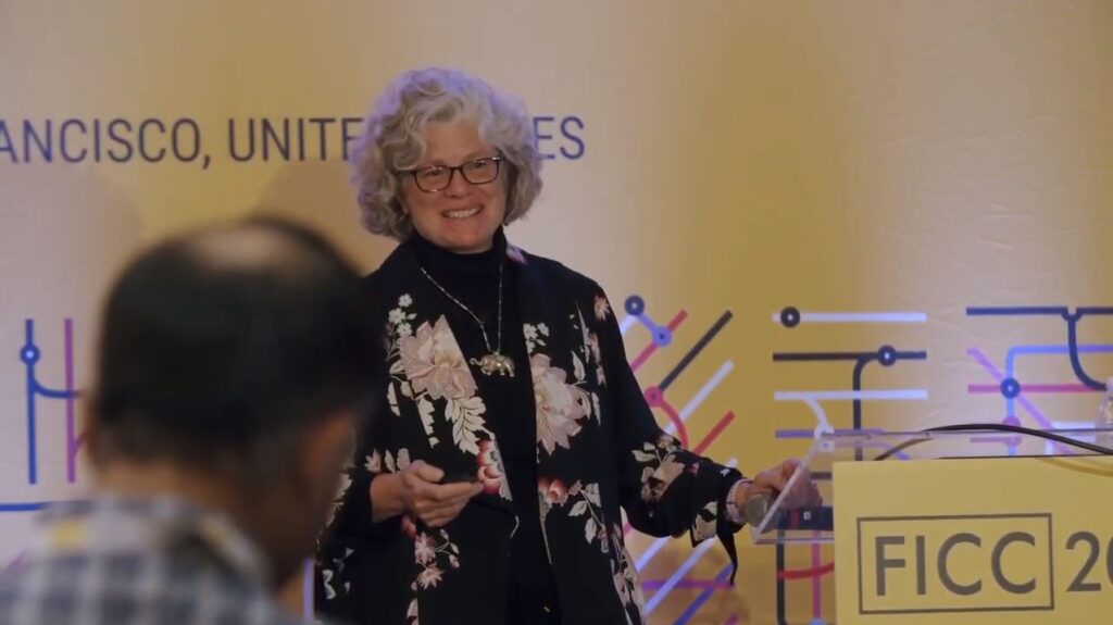 Kristin Lauter giving Keynote talk at FICC
