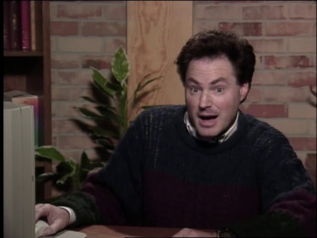 Eric Horvitz sitting on a table