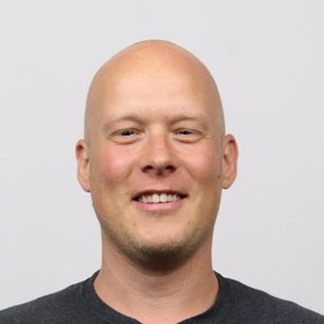 Portrait of CJ Williams from Microsoft and speaker at the Microsoft Research AI and Gaming Research Summit