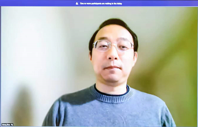 a man in a blue shirt